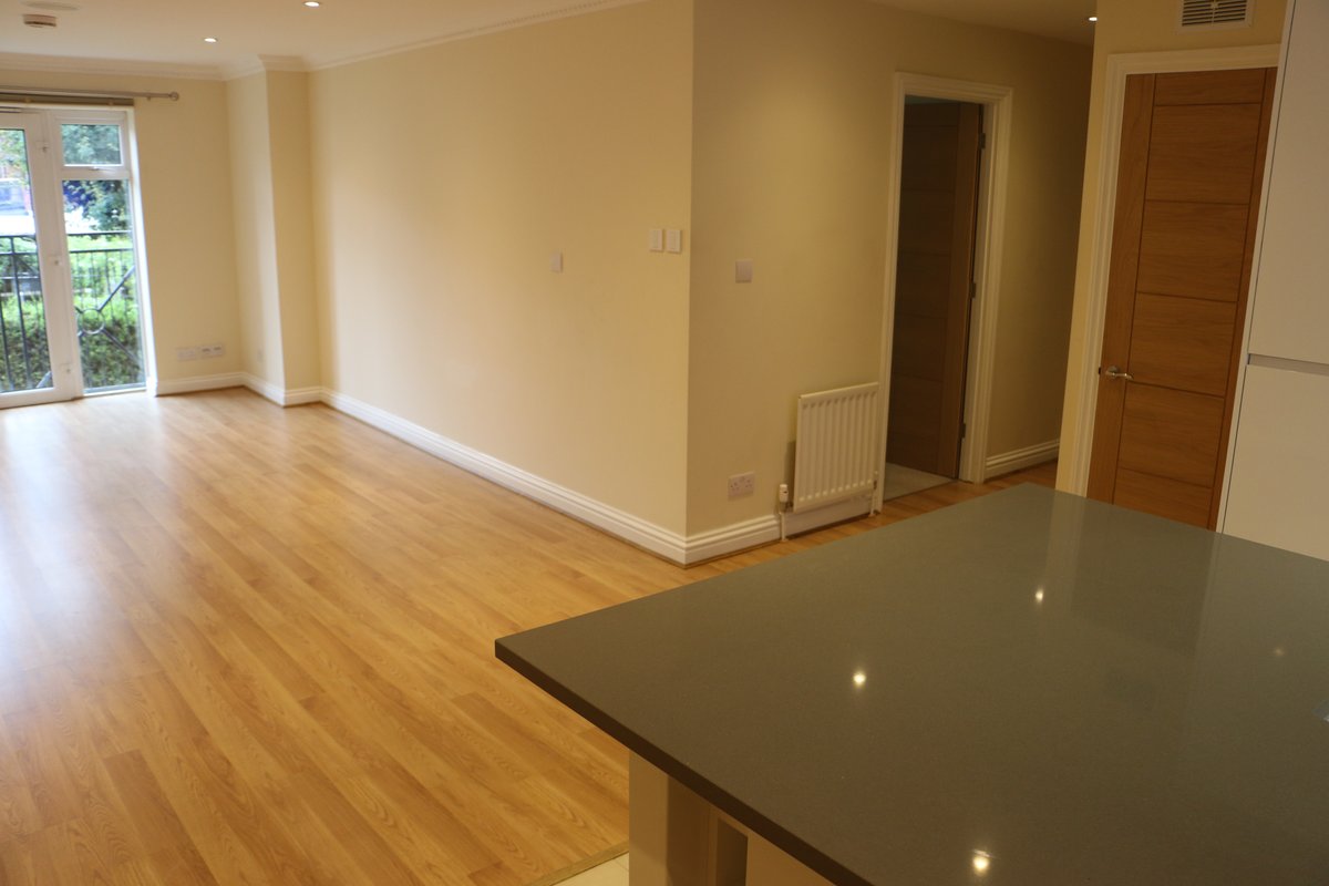 Open-plan living and kitchen layout — Ladymere Place apartment, Godalming