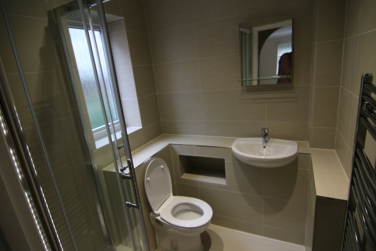 Ensuite bathroom with chrome fittings — Ladymere Place apartment, Godalming