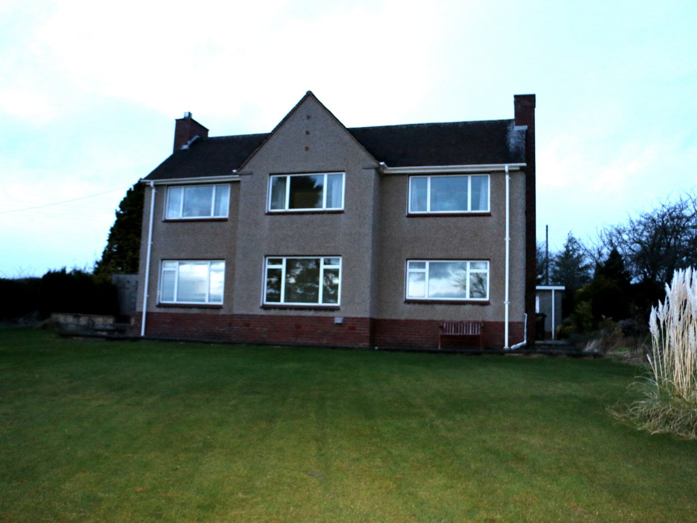Before transformation — original rendered detached family house, Northumberland (pre-rebuild)