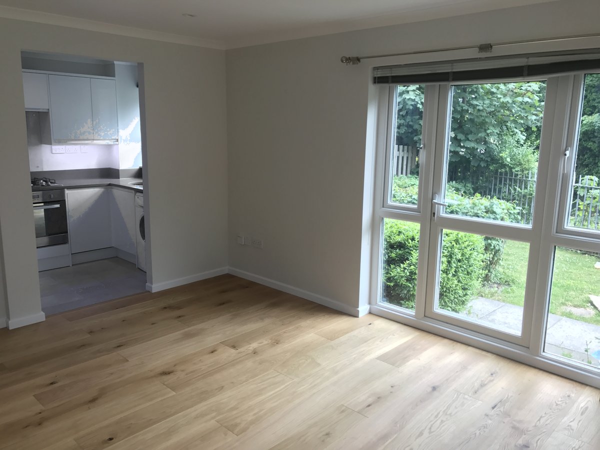 Open-plan living and kitchen with river outlook — Weyview Court apartment, Guildford