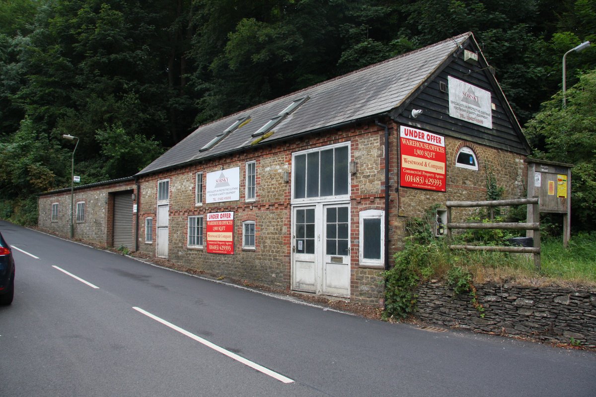 Before commercial conversion — The Old Forge as plumbers' merchants warehouse, Godalming, Surrey