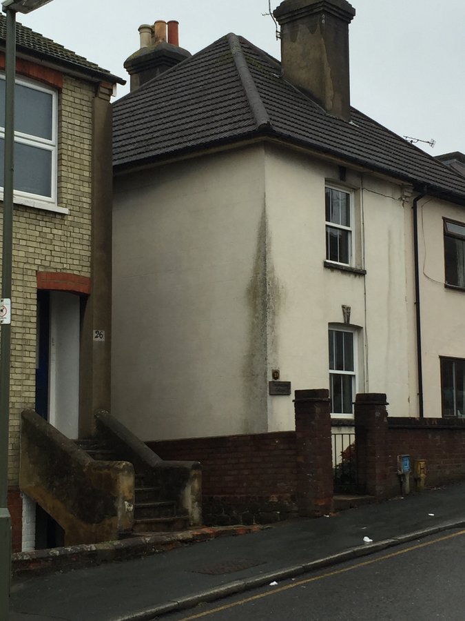 Before substantial extension — original cottage front, Denzil Road, Guildford