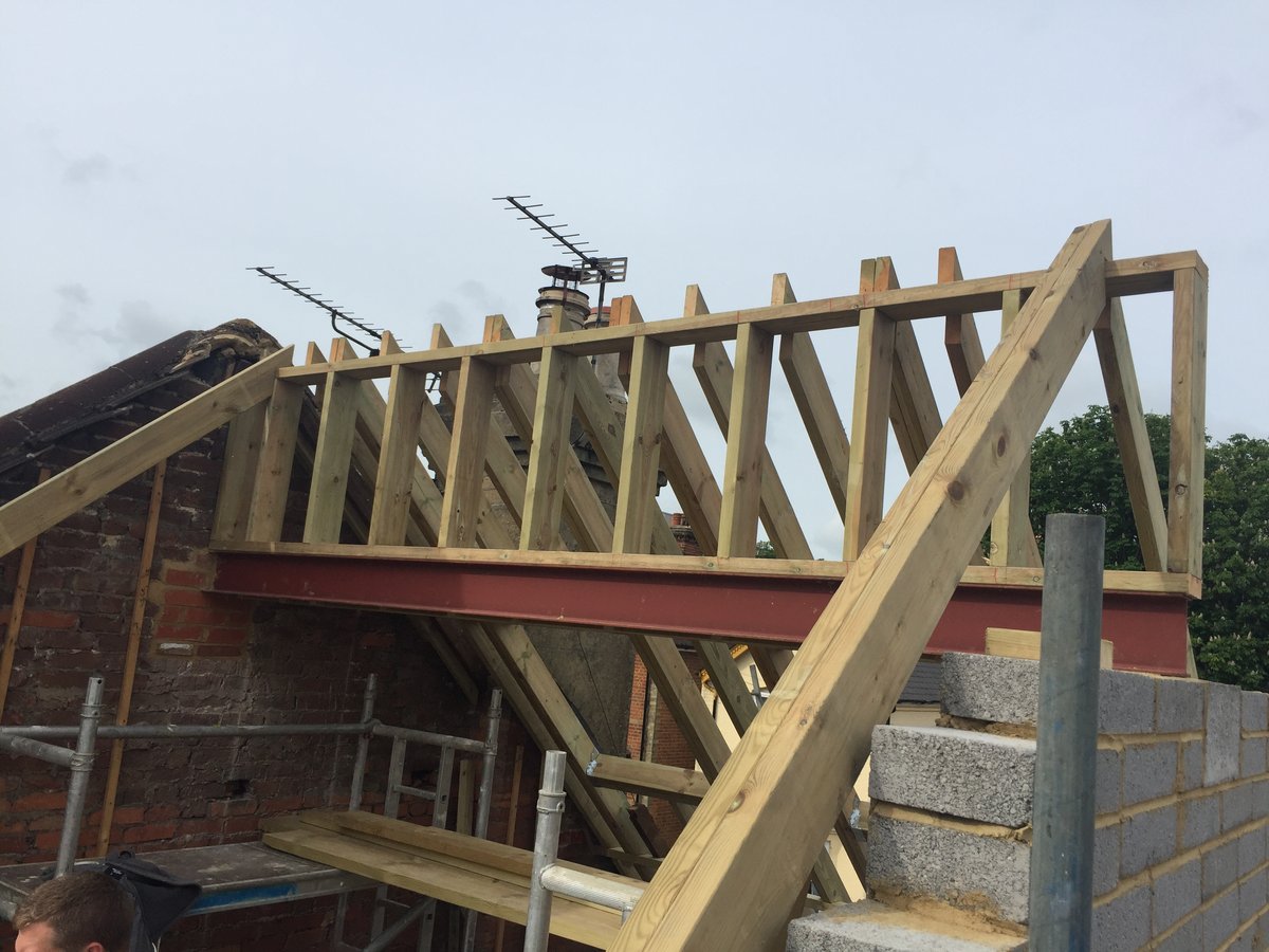New timber roof trusses installed — Denzil Road residential extension, Guildford